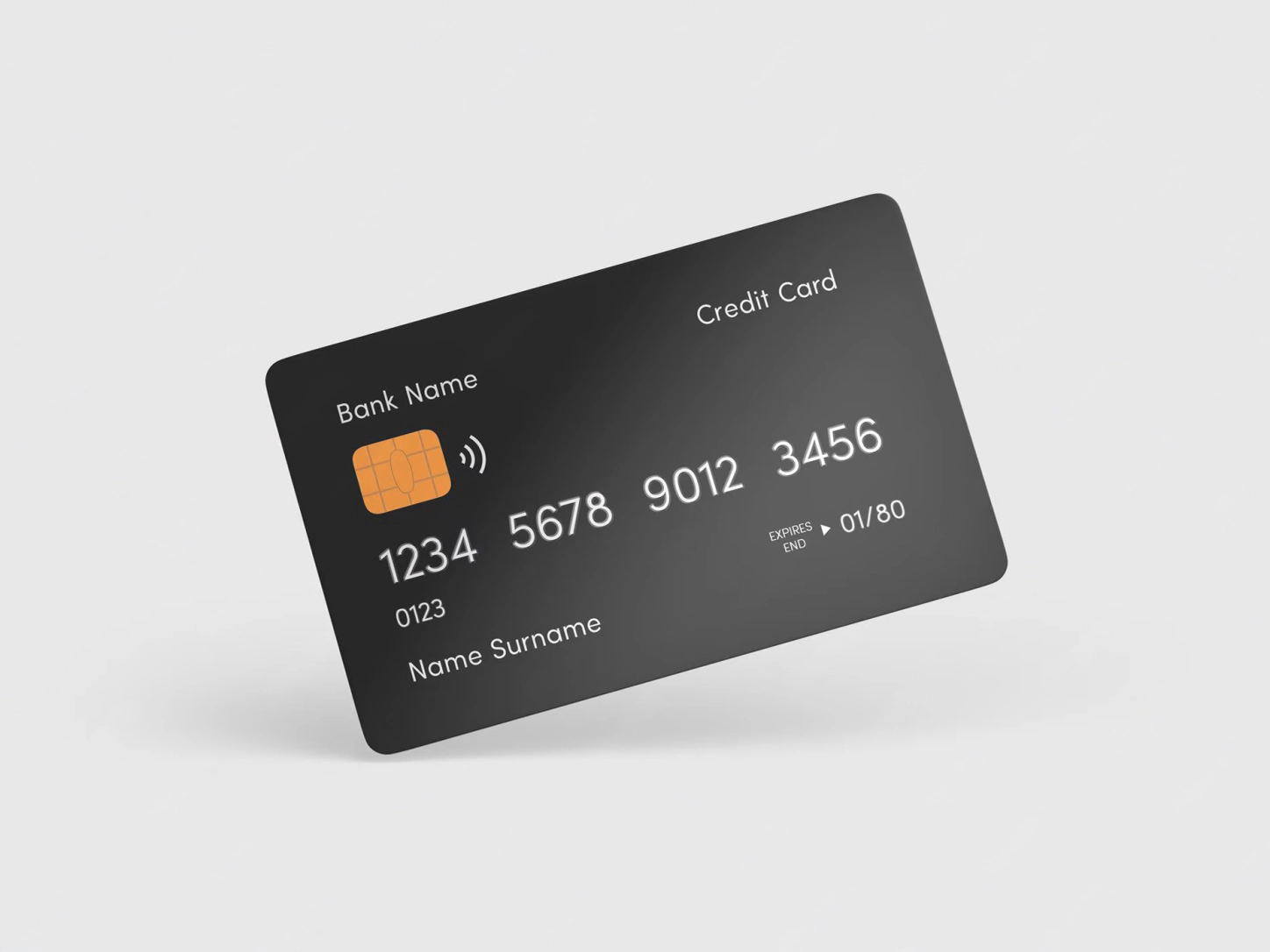 Una carta di pagamento nera con chip e contactless, su fondo grigio chiaro
